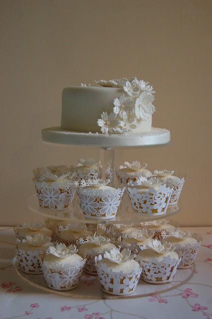White lace wedding cake matching cupcakes