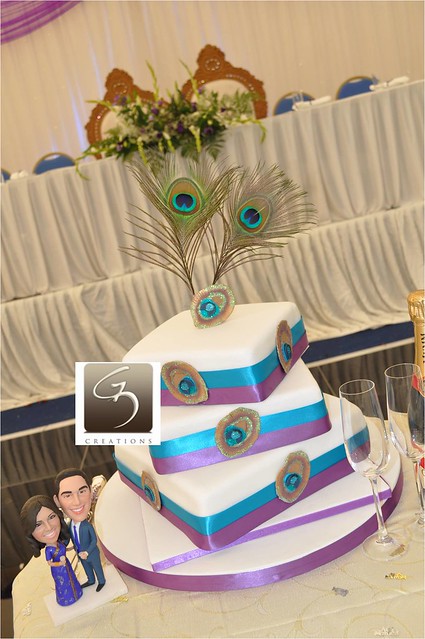 We have done lots of variations of Peacock wedding cakes for 2011