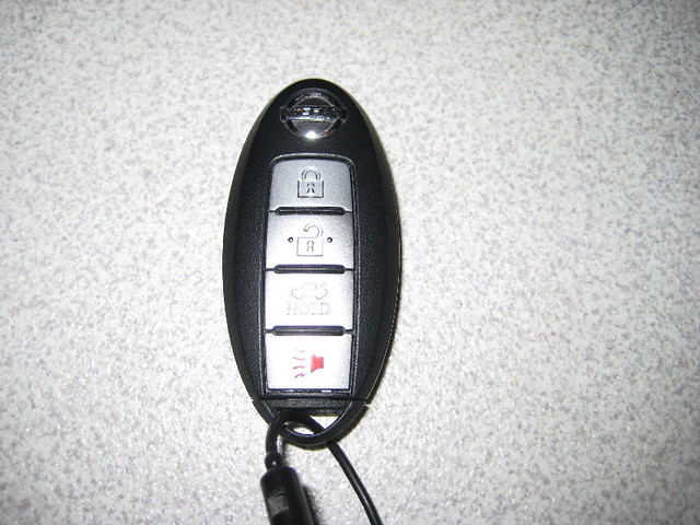 How to change battery in 2008 nissan altima key fob #3