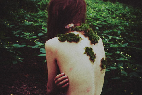 fairy tale about a small girl who slept in the woods and woke up being overgrown by moss and mushrooms. now she is a part of the woods. by laura makabresku