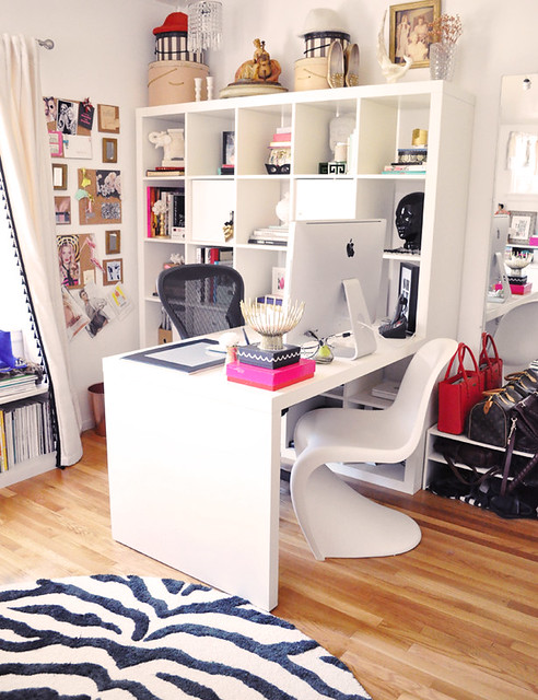 Ikea expedit desk in home office with zebra rug and panton chair