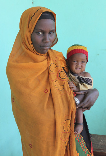 Tiru with her baby daughter, receiving nutrition support in southern Ethiopia, thanks to CARE International