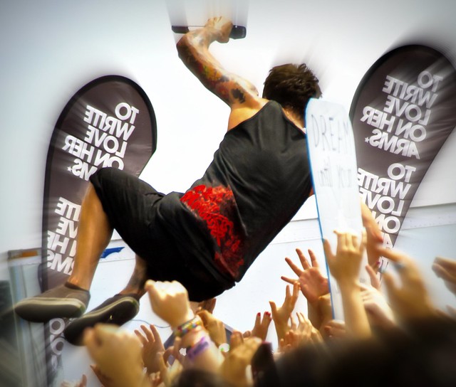 Simple Plan's Pierre Bouvier Jumps Into the Crowd at the Vans Warped Tour