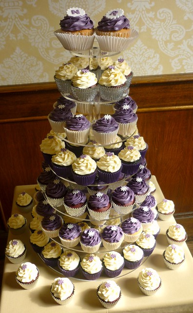 Purple themed wedding cupcake tower This was a lovely wedding with the ever