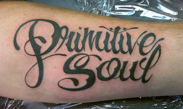 Our shop logo tattoo by Eric Hylland