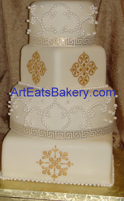 Four tier round and square custom wedding cake with gold stencil and sugar