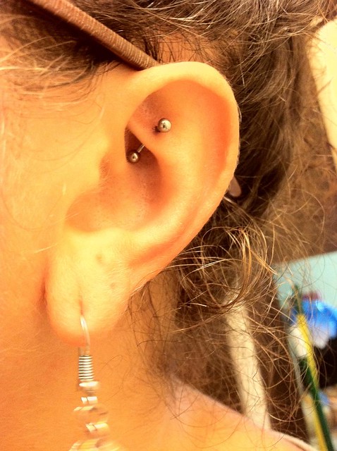 My rook piercing my newest piercing I have my tragus pierced on my right