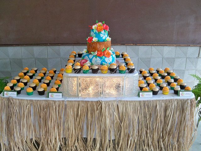 Hawaiian Themed Wedding Cake and Cupcake Display