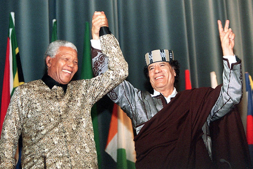 South African President Nelson Mandela with Libyan leader Muammar Gaddafi. The two leaders are recognized as pioneers in the struggle for national liberation and Pan-Africanism. by Pan-African News Wire File Photos