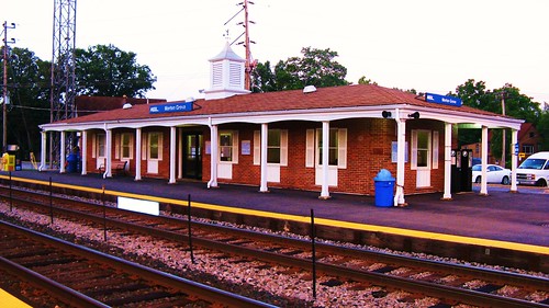 Sunrise at the Morton Grove Metra commuter rail station.  Morton Grove Illinois USA.  August 2011. by Eddie from Chicago
