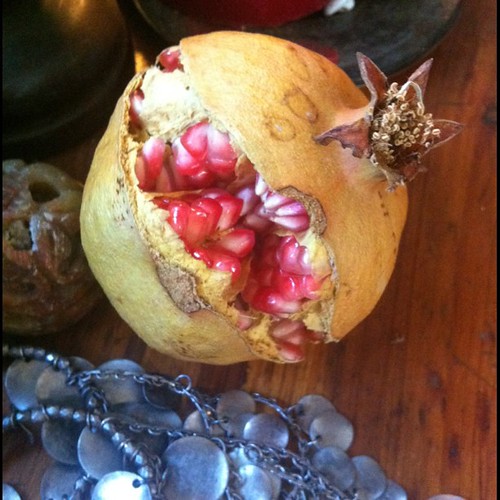 Split pomegranate, silver. It fell too soon from our tree.
