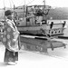 Shinto priest and fishing boat