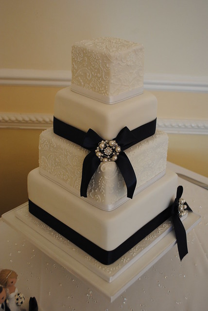 Navy and lace wedding cake