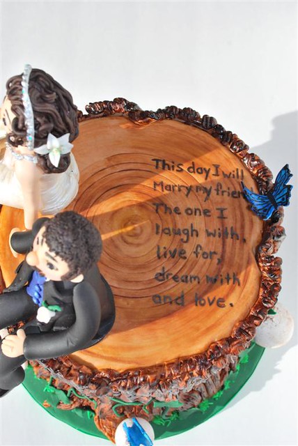 Tree Stump Wedding Cake Romantic saying on top of log cake