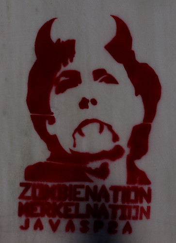 Zombie nation, Merkel nation . Stencil on the wall of a building in Thessaloniki, Greece