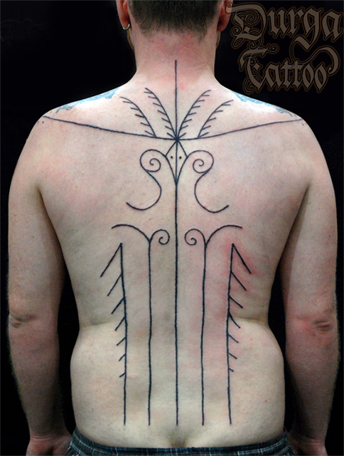 Another version of Mentawai tattoo motive for male's back with several long