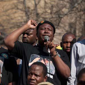 Julius Malema, president of the African National Congress Youth League (ANCYL), adresses the crowd of youth outside the parent body's disciplinary hearing. by Pan-African News Wire File Photos
