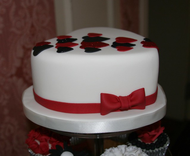 Black red and ivory wedding tower Heart shaped fruit cake with glittery 