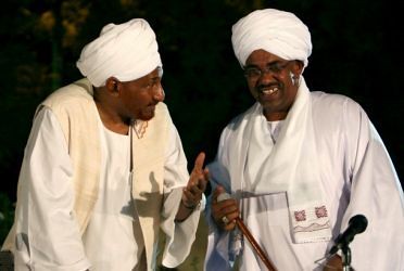 Sudan President Omar Hassan al-Bashir in dialogue with former prime minister and Umma Party leader al-Sadiq al-Mahadi. The Umma Party has broken off discussions. by Pan-African News Wire File Photos