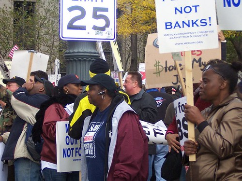 Thousands demonstrated in downtown Detroit on October 14, 2011 against the role of the banks in the economic crisis. Many occupied Grand Circus Park for weeks after the march. (Kris Hamel) by Pan-African News Wire File Photos