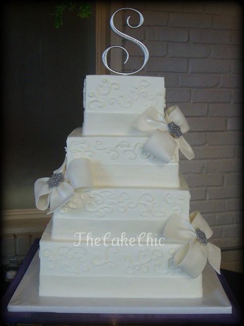 Bows and Bling Wedding Cake Iced in buttercream with fondant sugar ribbon 