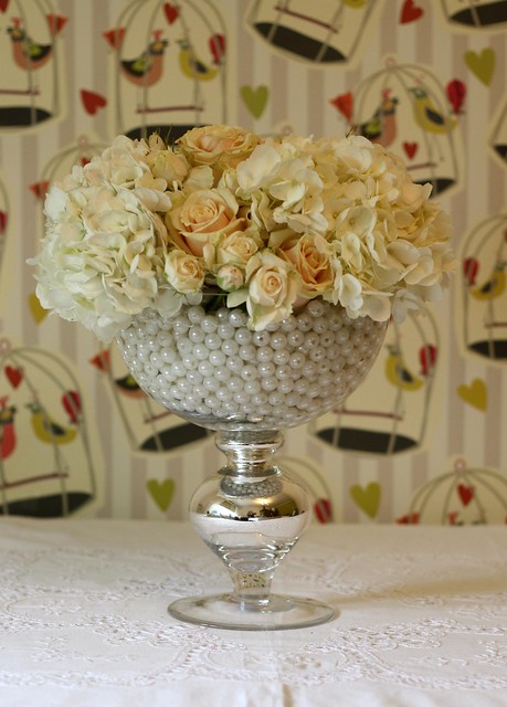 white hydrangeas and roses wedding table centre