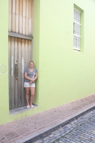 Rebecca in a colorful doorway in San Juan