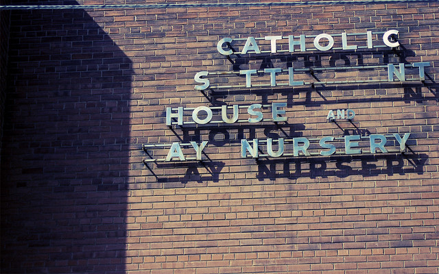 old school lettering lettering on the side of a building in toronto