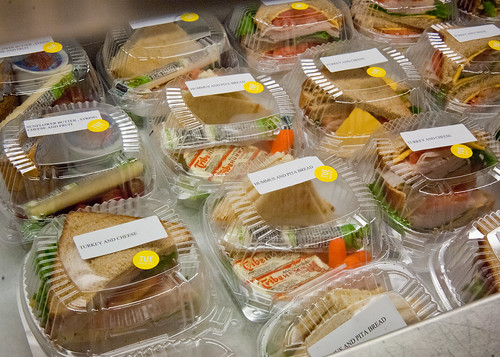 Hummus and Pita Bread, Sunflower butter string cheese and fruit, Turkey and cheese sandwiches prepared for the National School Lunch Program at Washington-Lee High School in Arlington, Virginia.