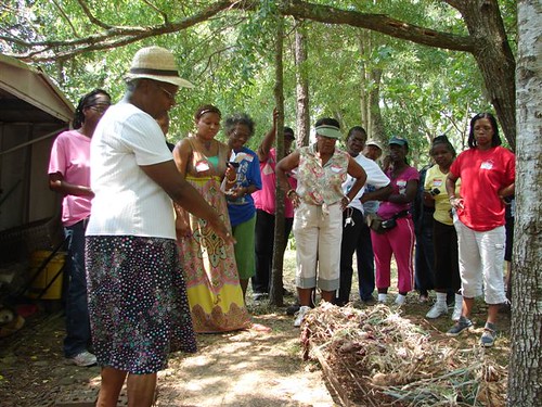 At a recent Women in Agriculture workshop held at her home, McGee shows how to properly compost.