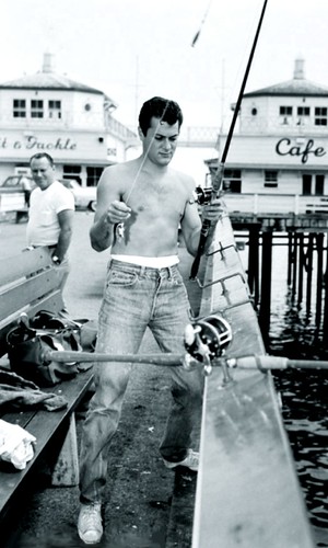 Tony Curtis fishing on Malibu Pier. by Movie-Fan