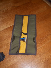Green tool roll with yellow lining