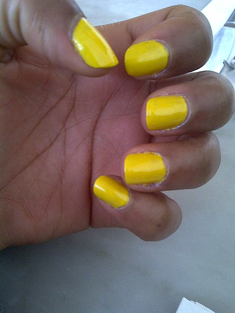 Getting used to this yellow nail polish. Colour doesn't seem right