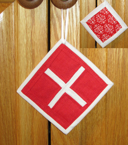 red cross ornament front and back