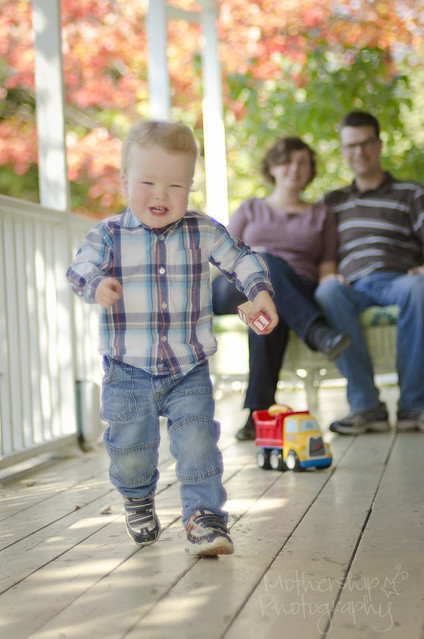 Porch Portraits with energetic Everitt and his parents