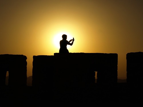 sunset sun man castle silhouette mobile wall phone arms cell dial syria palmyra