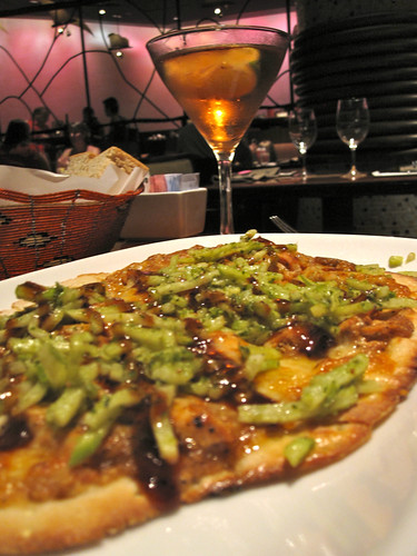 Barbecue Chicken Flatbread - Served with grilled onion, apple-jicama slaw, African barbecue sauce, and four cheeses