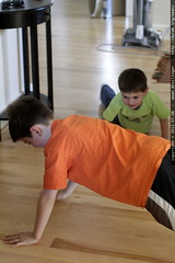 boys doing push ups to impress darika & brian 