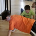 boys doing push ups to impress darika & brian