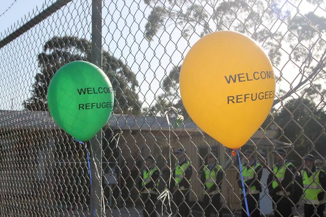 Police guard inside the fence - Refugee Rights Protest at Broadmeadows, Melbourne from Flickr via Wylio