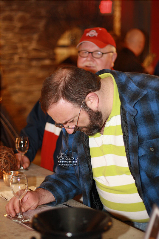 David_Concentrating_On_Wine_List