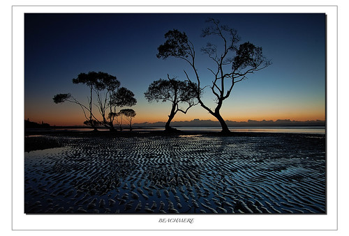 orange water sunrise sand glow mud tide ripples mangroves beachmere