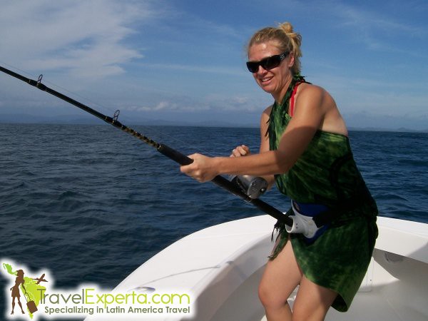 a women is fishing in puerto jimenez costa rica