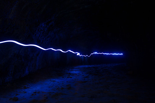 longexposure blue underground lava tube flashlight cave headlamp lassen