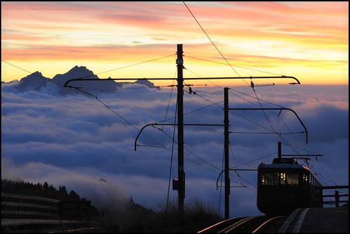 sunset mountain alps clouds train tracks peak alpine pilatus wires rails pylons rigi nebelmeer kulm hochnebel rigibahn brightenedatouch infilterstormapp 1900tovitznau