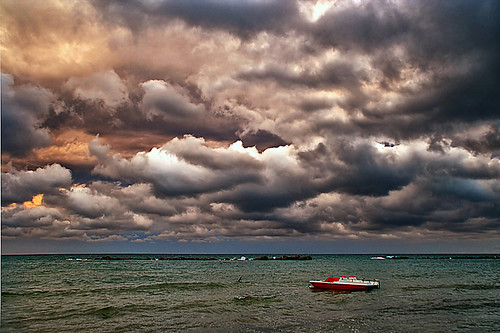sunset sea storm clouds boat barca tramonto nuvole mare tempesta