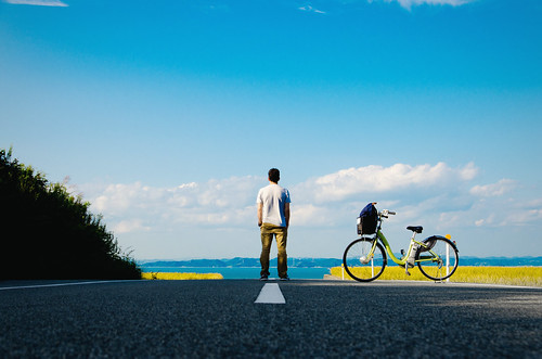 road sky people cloud nature bike bicycle japan landscape outdoors island photography japanese clothing nikon day loneliness transportation casual rearview oneperson contemplation individuality teshima handsinpocket kagawaprefecture lookingatview d7000