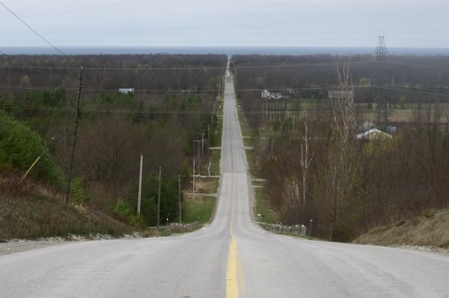 road trees lake march photo highway view pavement horizon country hill ridge wires leafless slope lakehuron hydrowires sprng