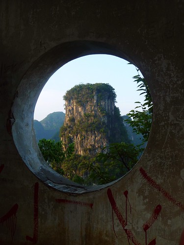 world china windows mountain mountains green heritage window beautiful beauty up look standing river out point asian rising graffiti li stand site high student asia alone view guilin yangshuo chinese culture down run lookout unesco faded portal rise guizhou karst dilapidated vantage guangxi shabby