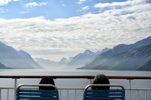 vacation holiday mountains norway scenery view chairs scenic tourists fjord hazy relaxation railings touristattraction hurtigruten coastalsteamer larigan phamilton unrecognisablepeople nordalsfjorden licensedwithgettyimages ginordic1